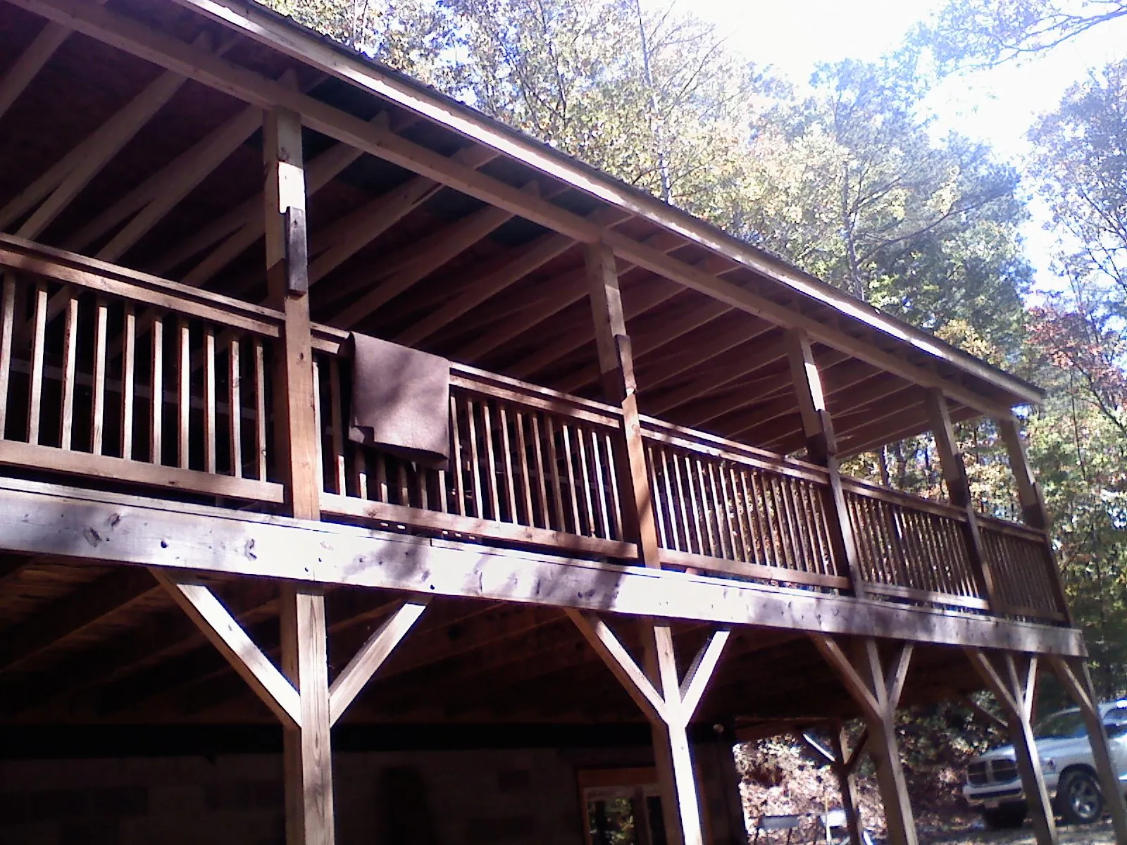 Timber framing under a new elevated porch and deck — Roof Leak Repair in Wakefield by Roofing Brothers